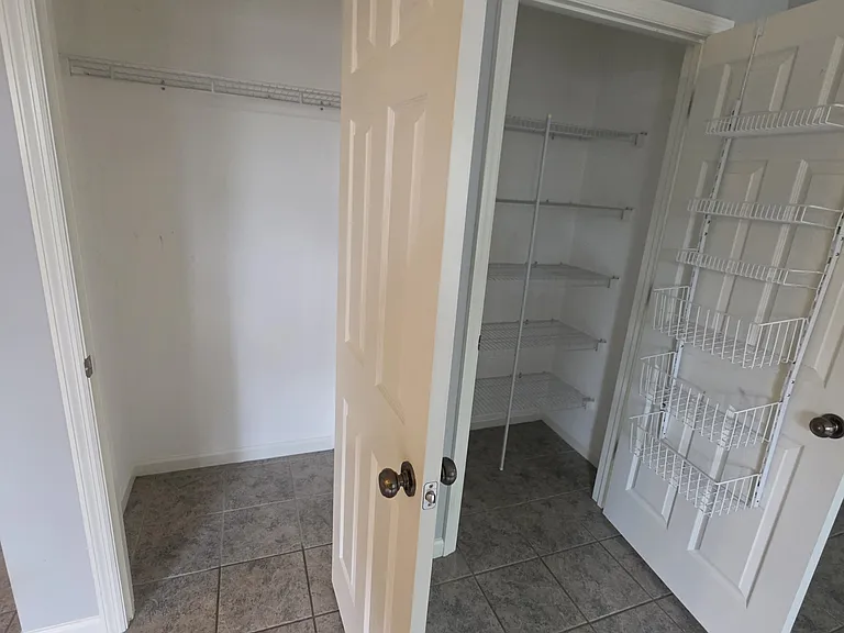 Storage and additional pantry beside the dining area