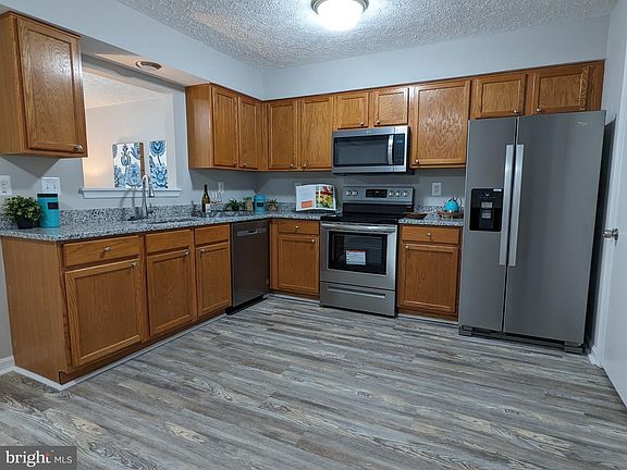 3rd image of 207 Woodland Green Way