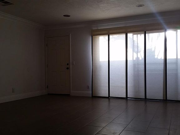 Living room with access to the private enclosed patio.