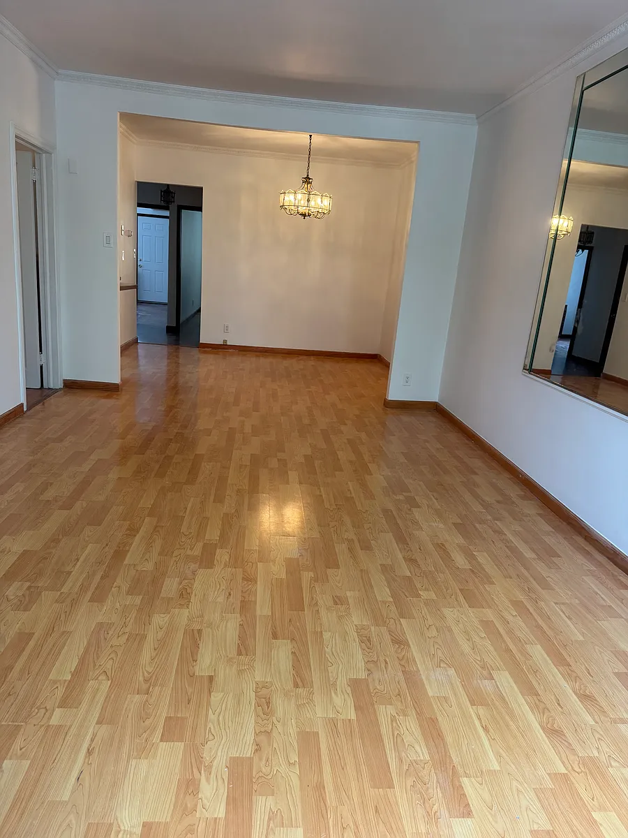 Formal dining room with gorgeous chandelier - 2624 Avenue X #2