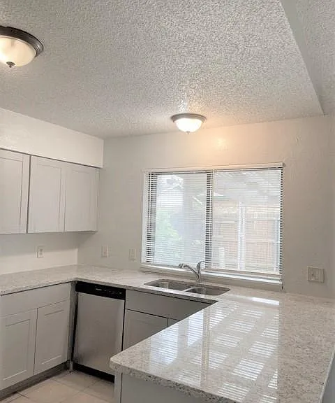 Oversized Kitchen with Stainless Steel Appliances and tons of cabinets
