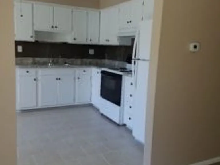 Villager Apartments — Photo 3