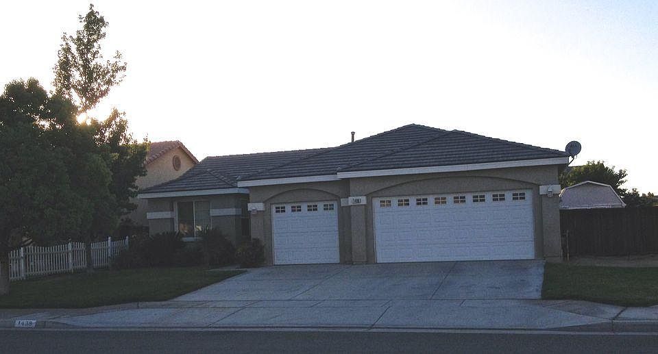 Single story home with attached 3 car garage
