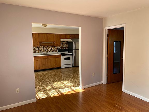 Living room looking into kitchen