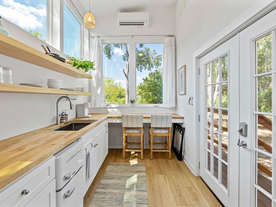 Spacious open floor plan with great natural light; overhead fan to ensure you stay cool in the loft!