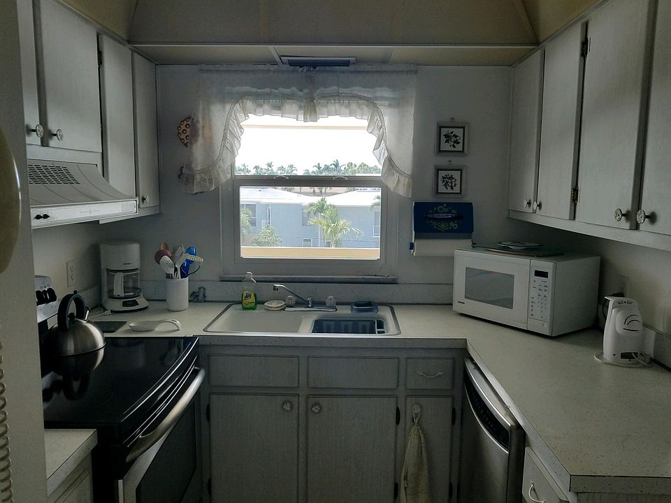 Kitchen with Stove and Microwave