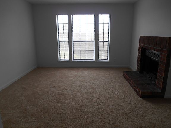 Living room w/wood burning fireplace