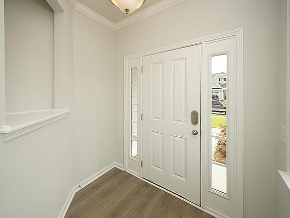 Photos are of a similar home