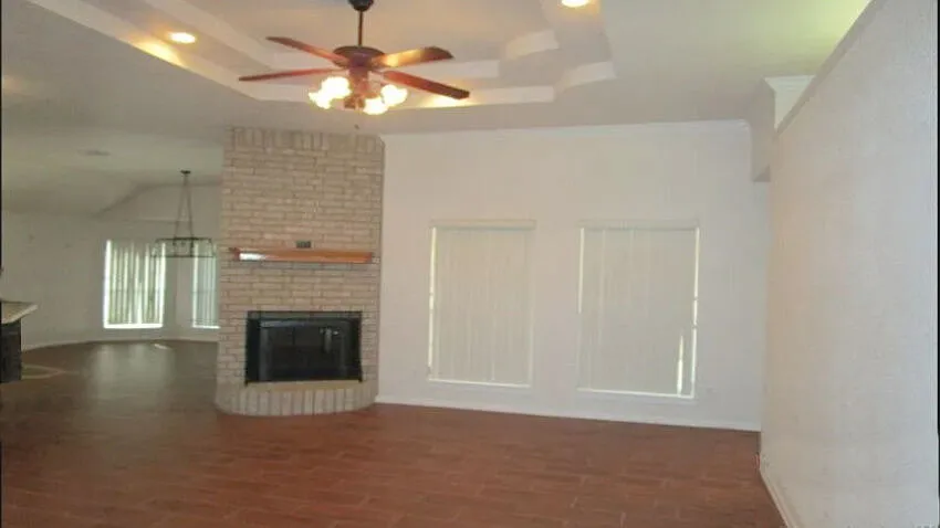 Living room with fireplace. - 2907 Bachelor Button Blvd