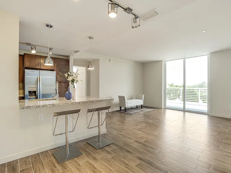 Both hardwood and tiled floors are offered