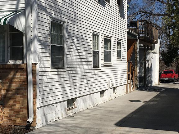 Driveway to rear parking and garage.