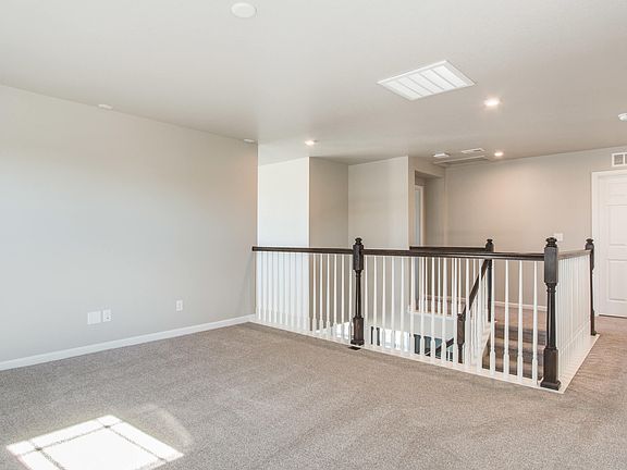 Upper level loft provides a secondary living space to watch TV, do homework, or just hangout.
