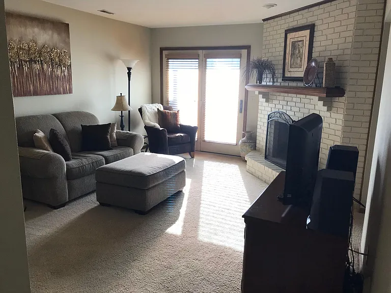 Living room with patio just outside double doors