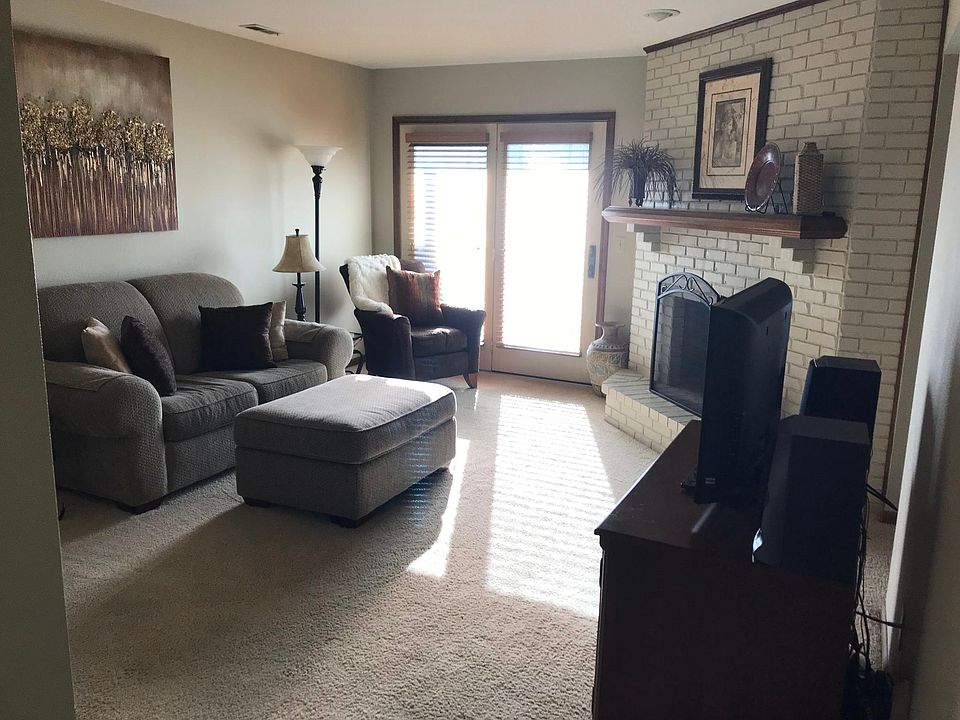 Living room with patio just outside double doors
