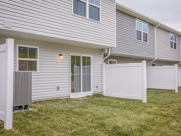 Back yards are separated by privacy fencing for a portion of the yard.