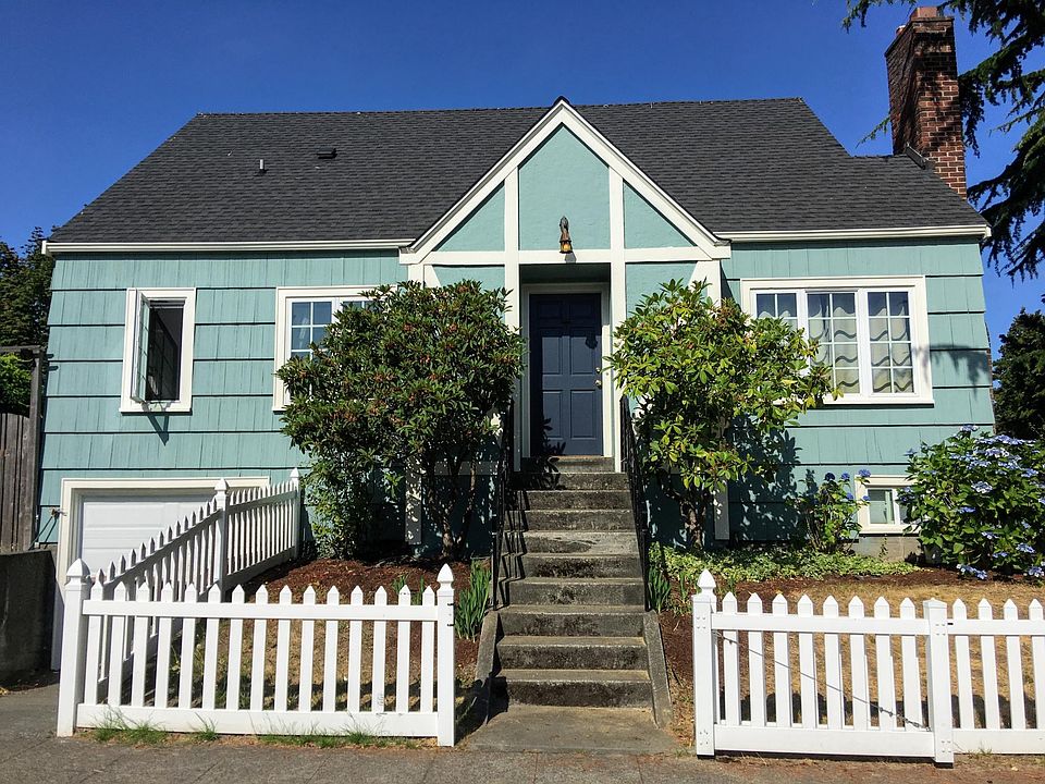 The front of the house faces east. The yard is fully fenced. The one-car garage has an automatic opener.