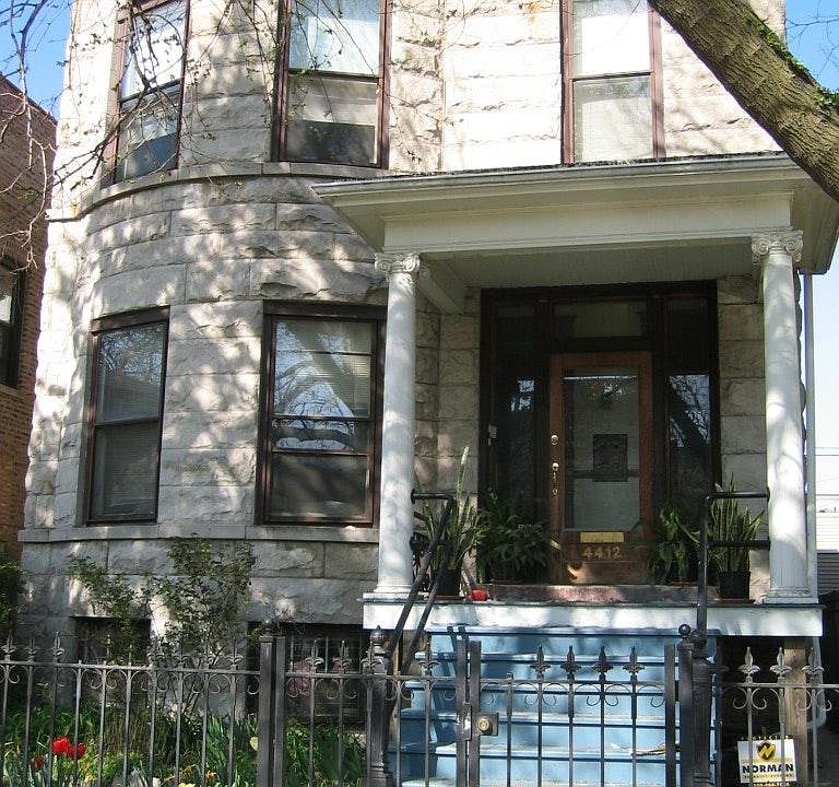 Historic greystone on quiet tree lined street