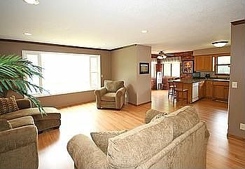 Open Plan over looking lake and pool area.