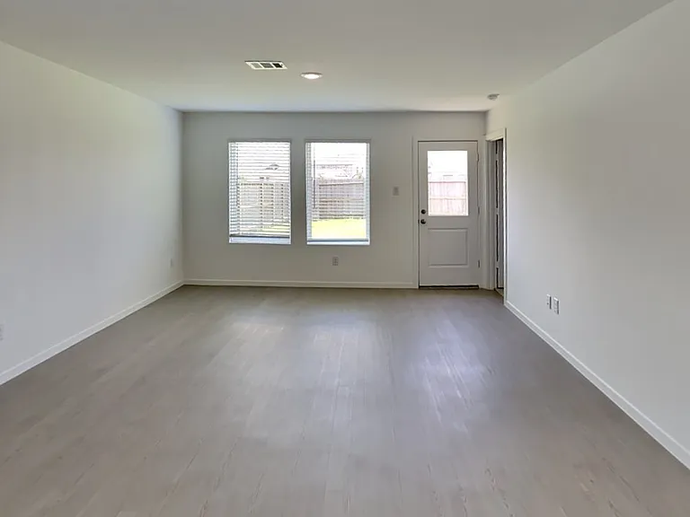 Spacious living room with ampl