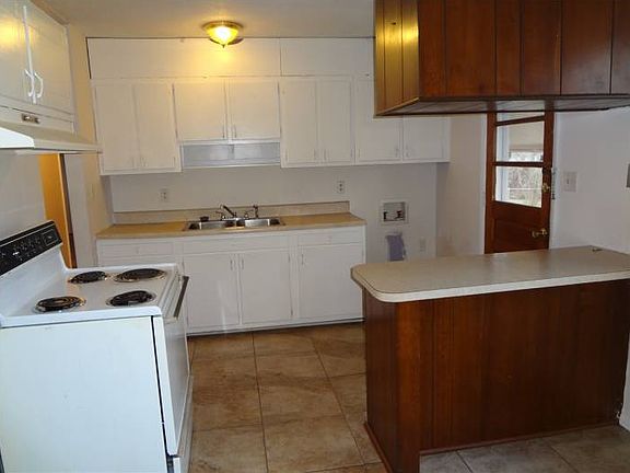 Kitchen has ceramic tile