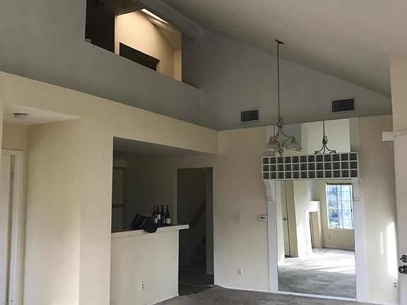 View from living room towards dining room and kitchen