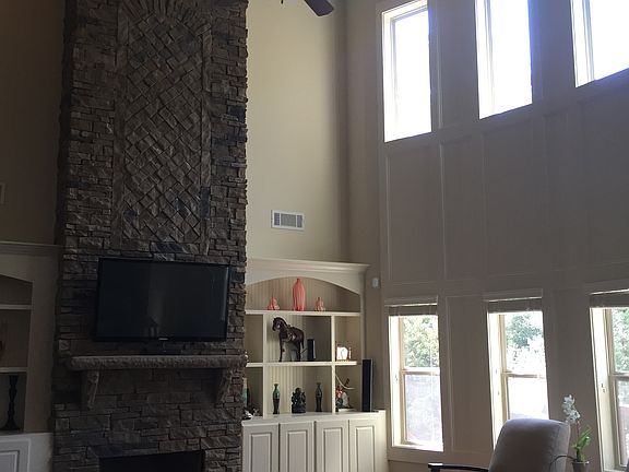 Two story stone fireplace 