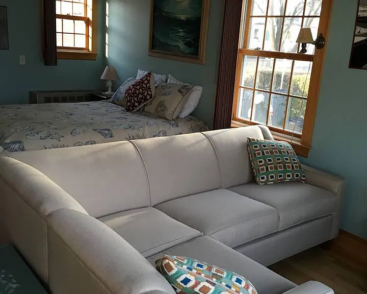 Couch and sleeping area from front windows