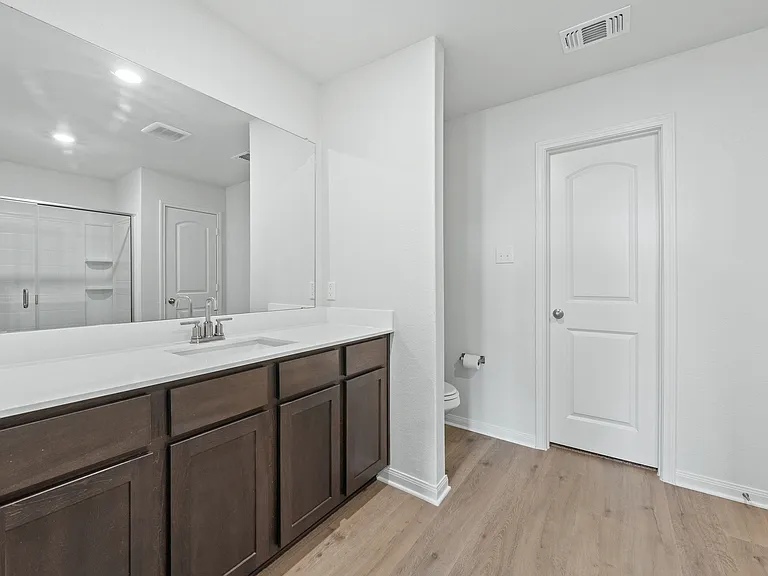 The master bathroom of the Sabine has a large vanity space.