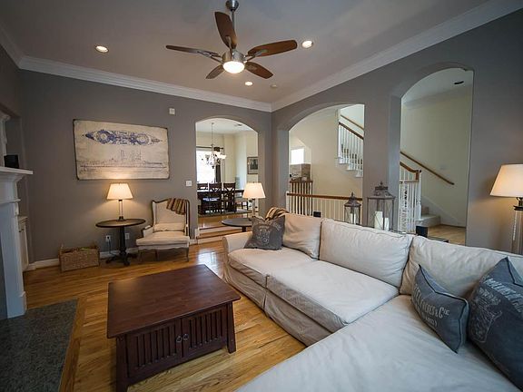 Notice the curved archways and the double crown molding.