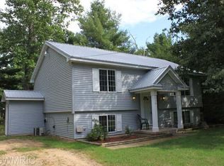 8436 Sarber Rd, Howard City, MI 49329