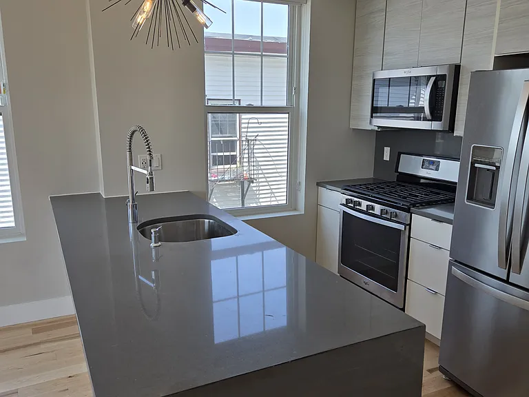 Kitchen with new floors (current photo).