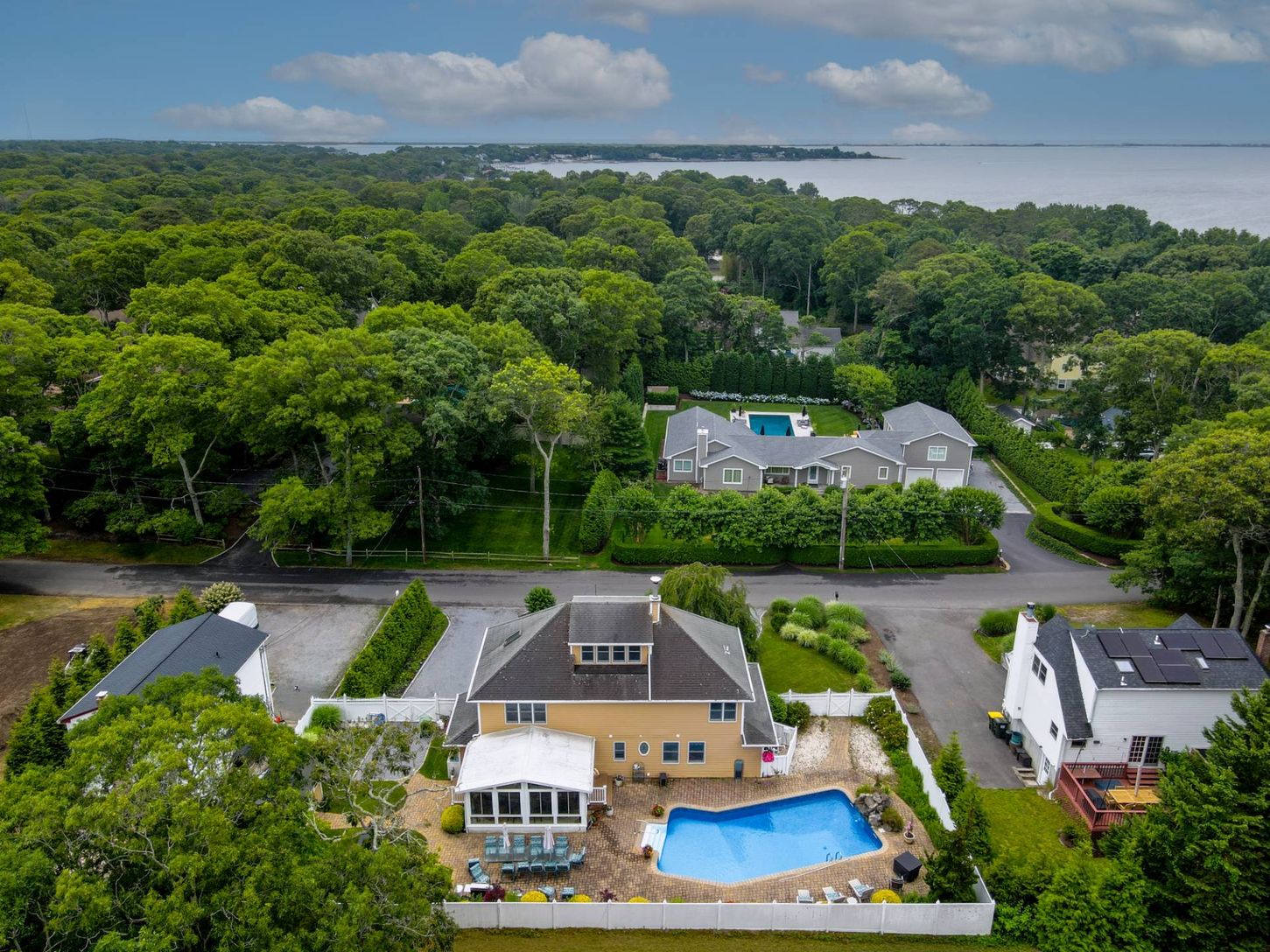 Aerial view of this south facing turnkey Hamptons summer getaway!