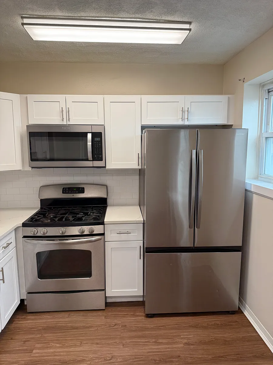 Stainless steel refrigerator, gas range, and built-in microwave included. - 899 Anchor St #2