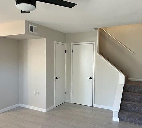 second bathroom and an extra closet under the stairs