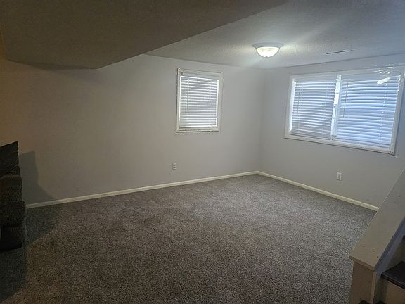 Finished basement with garage entry