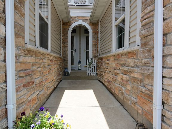 Welcoming Stone Arched Entry