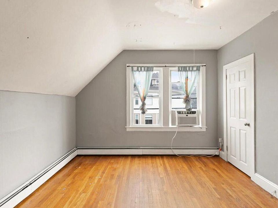Living room with a full sized closet.