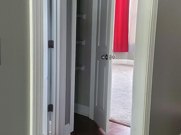 entry hall going into the main bath and 1st floor bedroom