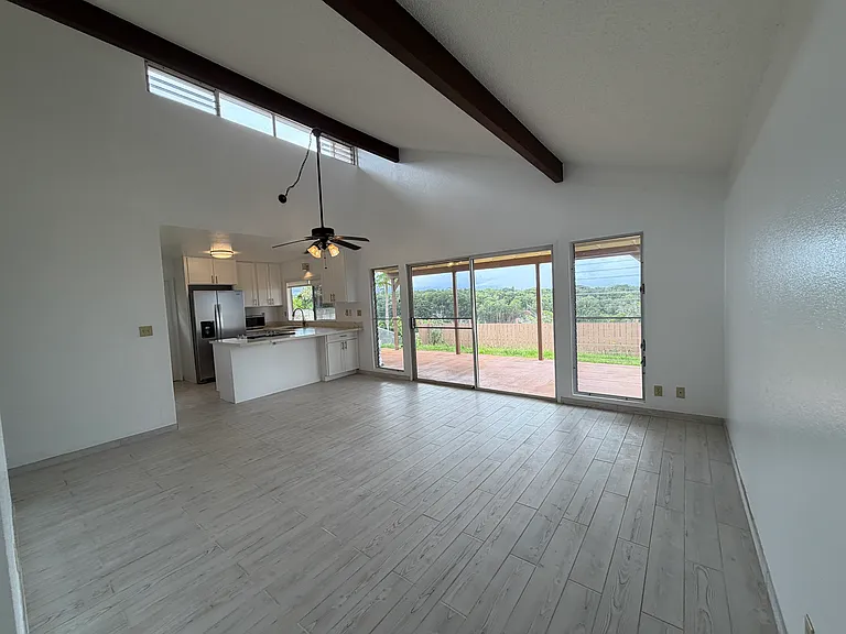 Spacious living room, vaulted ceilings, panoramic views from this perimeter lot