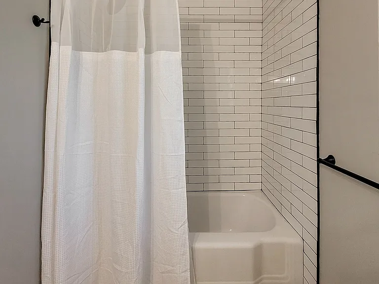 First bathroom, right side of the house.