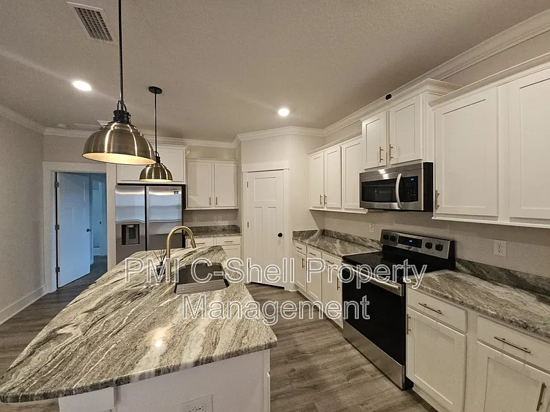 Building Photo - 6047 Twenty One Oaks Dr