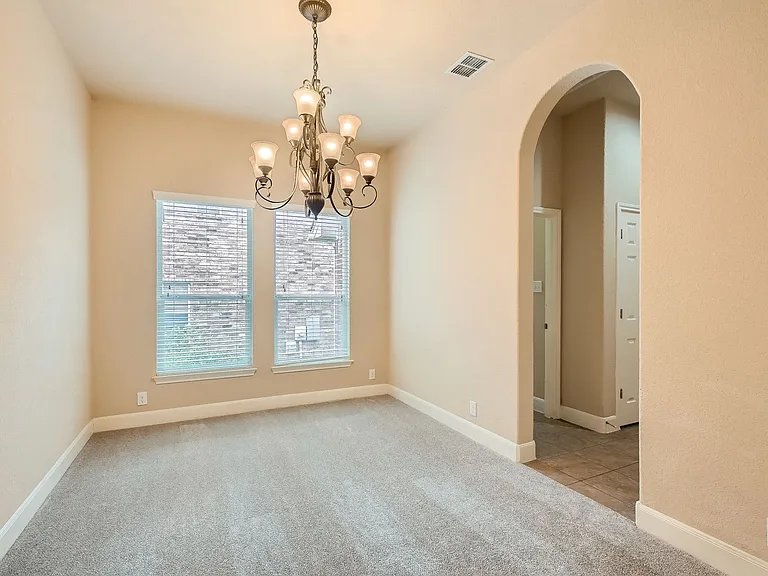 formal dining with access to laundry room and two pantries