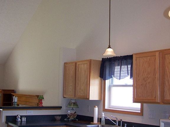 Vaulted ceilings over kitchen & livingroom