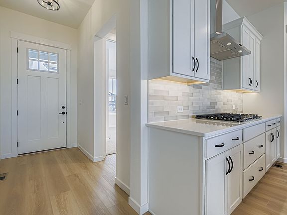 Plan C416 front entry representative photo