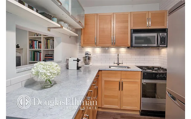 Sold by Douglas Elliman | media 10
