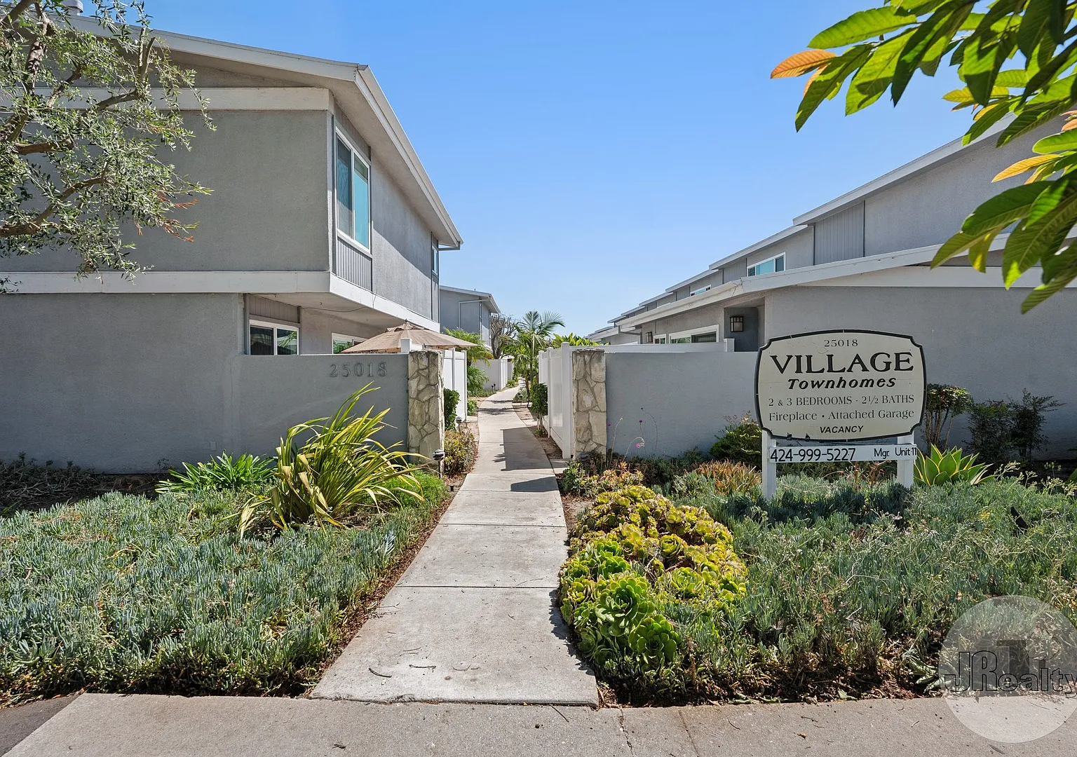 Village Townhomes — Photo 1