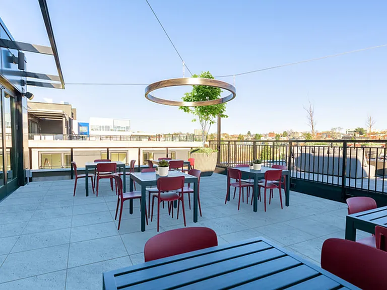 Hangout or dine outdoors with multiple tables on the sky deck