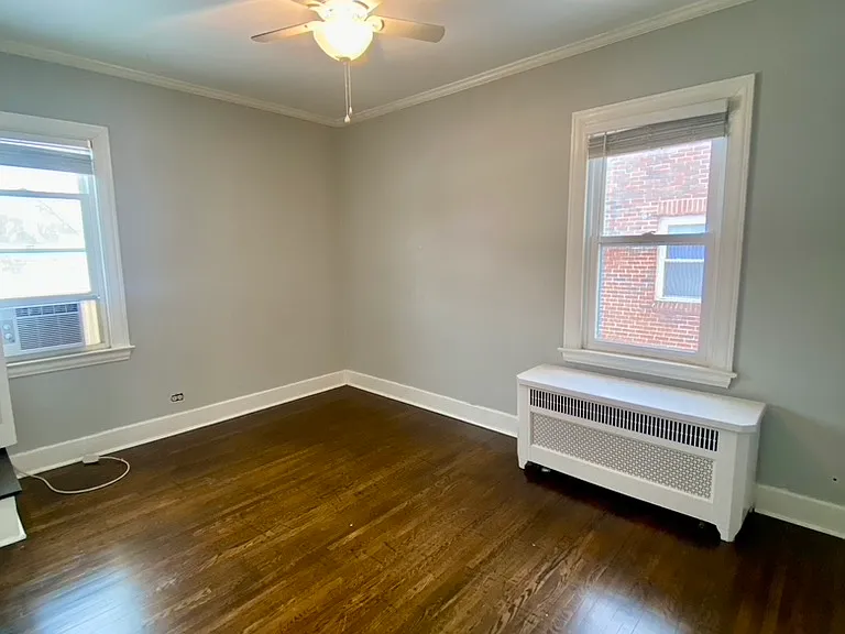 bedroom with hardwood floors