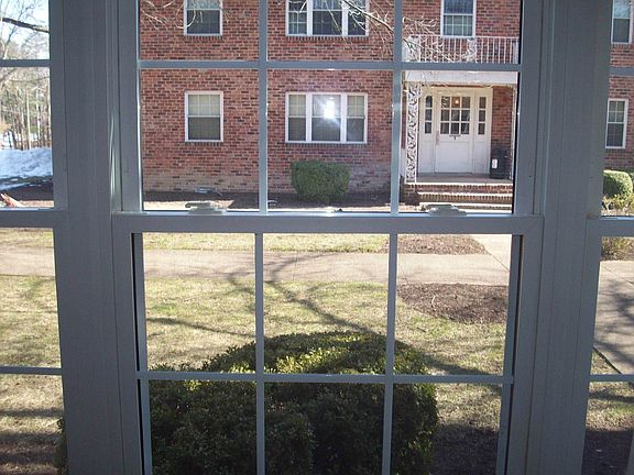 Large open bright window looking out to courtyard