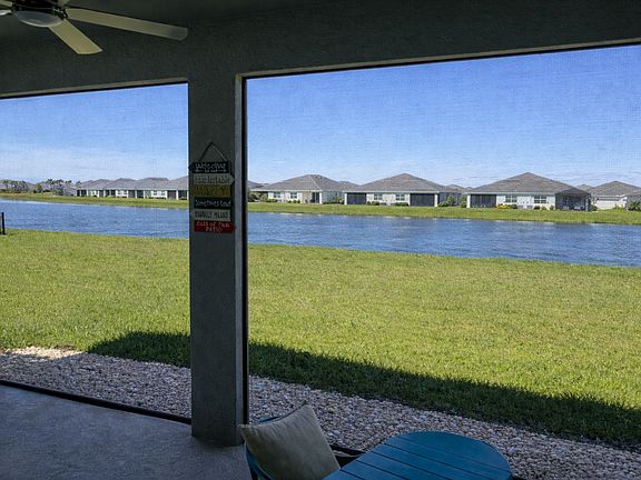 "Private screened-in lanai for indoor-outdoor living"